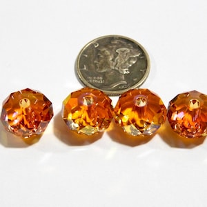 Astral Pink 12 mm Swarovski Art 5041 briolette-kralen. 2 stuks