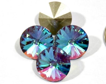 Aqua Transmission F 12 and 14mm Swarovski Art 1122 Rivoli Stone