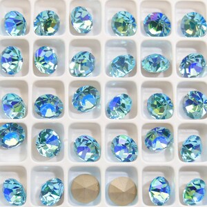 39ss - 8mm Aqua Bohemica Sparkles F Preciosa Maxima Chatons