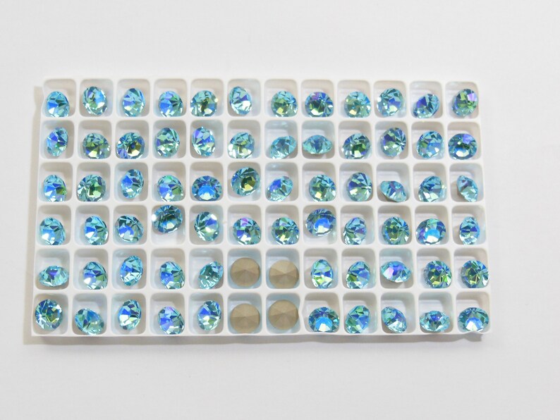 39ss - 8mm Aqua Bohemica Sparkles F Preciosa Maxima Chatons