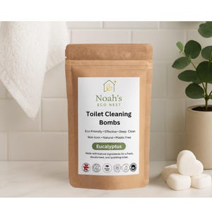 May include: A brown paper bag of "Noah's Eco Nest" toilet cleaning bombs. The label reads "Eucalyptus" and lists eco-friendly, non-toxic, and plastic-free features. Several heart-shaped cleaning bombs are visible to the right.