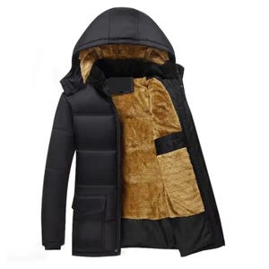 May include: Black winter coat with a hood and a warm, tan-coloured interior lining. The coat has a zip closure, pockets, and a quilted design. A practical and stylish outerwear option for cold weather.