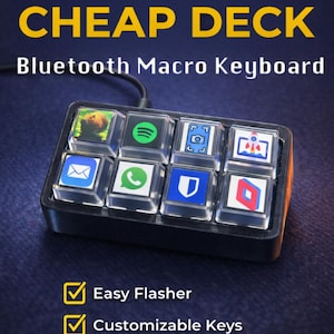 Può includere: Una tastiera macro Bluetooth ESP32 Stream Cheap Deck nera con otto tasti personalizzabili che mostrano varie icone. Il dispositivo include un cavo USB ed etichette di testo per Easy Flasher, Customizable Keys e USB / Bluetooth.