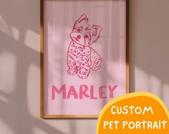 May include: A framed wall art print featuring a pink background with a dark pink line art illustration of a small dog. Below the dog, the name MARLEY is printed in bold, dark pink capital letters. The frame is made of medium-toned wood.