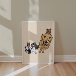 May include: A framed art print on a light beige background featuring a white and brown bulldog and a golden retriever. Each dog has a small glass of amber liquid with a garnish balanced on its head. The illustration uses bold black outlines.