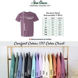 May include: A mauve Comfort Colors 1717 heavyweight t-shirt with a size chart and colour options. The size chart shows chest and length measurements in inches. The colour chart displays various shirt colours, including Light Green, Moss, and Berry.
