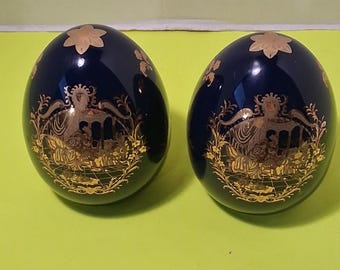 They are "Limoges style"  Vintage two porcelain eggs. Cobalt  blue and gold .