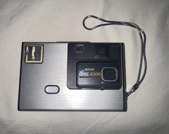 Vintage Kodak Disc 4000 Kamera mit Blitz und Handschlaufe