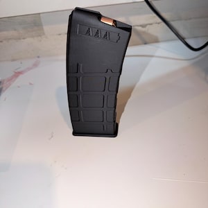 Ar magazine battery dispenser AAA