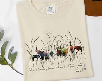 Colossians 3:14 Shirt – Christian Bird Art T-Shirt – Bible Verse Love Unity Tee – Minimalist Watercolor Crane Design – Faith Based Gift