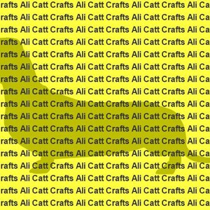 May include: A yellow background with the text "Ali Catt Crafts" repeated in black text. A silhouette of a cat is visible in the center of the image.
