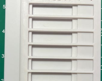 Jig for laser engraver to do claw type bottle openers.
