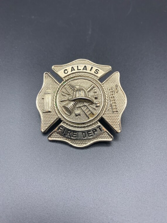 Vintage fire department metal Gem