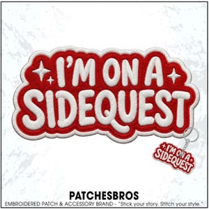 May include: An embroidered patch and a matching keychain featuring the white text I'M ON A SIDEQUEST on a red background with white borders and four-pointed star accents. The design is bold with a thick, raised texture and rounded edges.