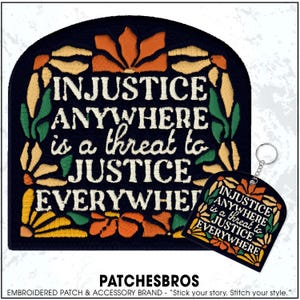 May include: A black embroidered patch and keychain with the text "INJUSTICE ANYWHERE is a threat to JUSTICE EVERYWHERE." The patch and keychain have a floral design in orange, yellow, and green.