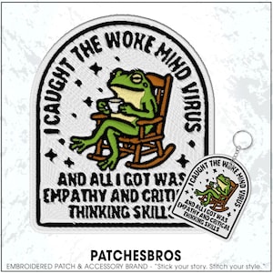 May include: Embroidered patch and keychain set featuring a green frog in a rocking chair, holding a cup. The patch reads "I caught the woke mind virus" and "And all I got was empathy and critical thinking skills."