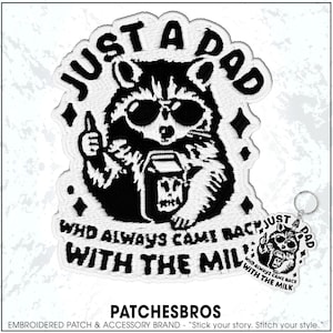 May include: Embroidered patch featuring a raccoon wearing sunglasses, holding a bottle and a milk carton. Text reads "JUST A DAD WHO ALWAYS CAME BACK WITH THE MILK." Includes a matching keychain. Black and white design.