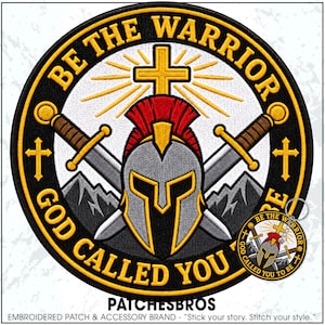 May include: A circular embroidered patch featuring a silver Spartan helmet with a red crest, two crossed swords, a yellow cross with rays, and mountains. The black border contains the yellow text BE THE WARRIOR GOD CALLED YOU TO BE.