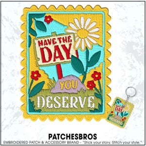May include: Embroidered patch with a yellow scalloped border, featuring the text "HAVE THE DAY YOU DESERVE." The design includes a daisy, flowers, and a sign. A matching keychain is also shown.