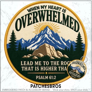 May include: A circular embroidered patch featuring a mountain landscape with a sun, pine trees, and a large rock formation. The text reads: WHEN MY HEART IS OVERWHELMED LEAD ME TO THE ROCK THAT IS HIGHER THAN I PSALM 61:2. A matching keychain is included.