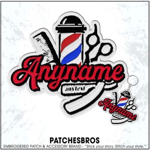 May include: Embroidered patch with barber shop theme. Features a red and white barber pole, scissors, comb, and a straight razor. The word "Anyname" is in red script. A smaller keychain version is also shown.