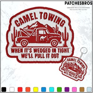 May include: Embroidered patch and keychain set featuring a red tow truck with a camel graphic. The patch and keychain read "CAMEL TOWING" and "WHEN IT'S WEDGED IN TIGHT WE'LL PULL IT OUT". The patch has a white border and the keychain has a silver chain.