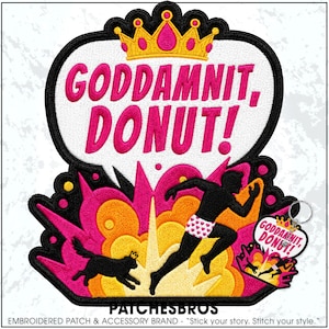 May include: An embroidered patch featuring a speech bubble with the text "GODDAMNIT, DONUT!" in pink, topped with a yellow crown. Below, a black silhouette of a person in heart-patterned underwear runs away from a black cat with a crown.