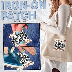 May include: An iron-on patch featuring a black and white illustration of a bird perched among flowers and leaves. The text RADICALIZED BY BASIC DECENCY is printed in brown lettering around the graphic. The patch is shown applied to a beige tote bag.