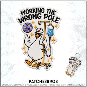 May include: An embroidered patch featuring a white goose wearing a nurse hat and sunglasses, giving a thumbs up next to an IV pole. The text reads WORKING THE WRONG POLE. It includes a colorful disco ball, yellow stars, and a blue IV bag.