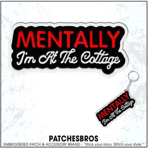 May include: Embroidered patch and keychain set with the text "MENTALLY I'm At The Cottage" in red and white on a black background. The patch and keychain have a white border.