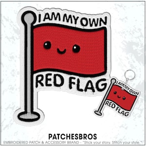 May include: Embroidered patch and keychain set featuring a red flag design with the text "I AM MY OWN RED FLAG." The flag has a smiling face. The patch and keychain are white with black outlines.