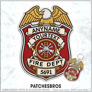 May include: An embroidered shield-shaped patch and a matching keychain featuring a bald eagle at the top, a red center with crossed fire axes, a ladder, and a helmet. The design includes banners with the text ANYNAME, YOURTEXT, FIRE DEPT, and 5691.