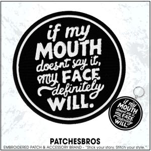 May include: Black embroidered patch with white text: "if my MOUTH doesn't say it, my FACE definitely WILL." A matching keychain is also shown. The patch and keychain are round with a white border. The brand name "PATCHESBROS" is at the bottom.