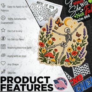 May include: An embroidered patch featuring a skeleton dancing amidst colourful wildflowers, mushrooms, and butterflies under a crescent moon. The design includes orange, yellow, red, purple, and green threads on a beige background with a scalloped edge.
