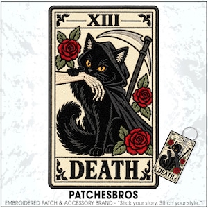 May include: An embroidered patch and a matching keychain featuring a tarot card design labeled XIII DEATH. The artwork depicts a black cat wearing a hooded cloak, holding a scythe, and interacting with a skeletal hand, surrounded by red roses.