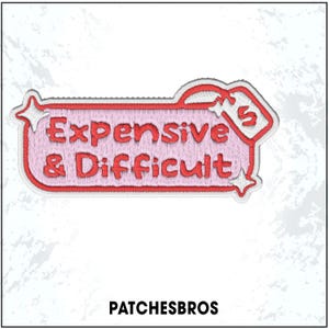May include: Embroidered patch in a tag shape with the words "Expensive & Difficult" in red on a pink background. The patch has a red border and white star accents. The brand name "PATCHESBROS" is at the bottom.