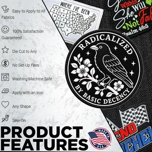 May include: A circular black embroidered patch featuring a white crow perched on a flowering branch with the text RADICALIZED BY BASIC DECENCY. Additional patches include a map of the United States and a checkered flag design on a black background.