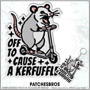May include: Embroidered patch featuring a gray rat riding a scooter, with the text "OFF TO CAUSE A KERFUFFLE." The patch has a white border and a matching keychain. The design includes black, pink, and white colors.
