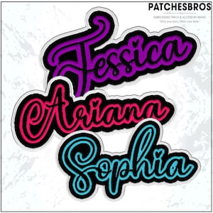 May include: Embroidered name patches in purple, pink, and blue. The names "Jessica", "Ariana", and "Sophia" are displayed in a cursive font with a black outline and white border. The patches are from the brand "PATCHESBROS".