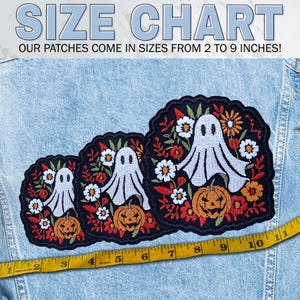 May include: Embroidered Halloween patches featuring a white ghost, orange pumpkin, and floral design. The patches are displayed on a denim jacket with a measuring tape showing sizes from 2 to 9 inches. Text reads "SIZE CHART".