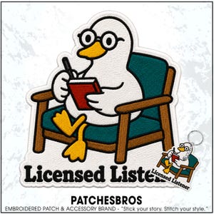 May include: An embroidered patch and matching keychain featuring a white duck with yellow feet and a beak, wearing round black glasses. The duck sits in a teal armchair with brown wooden arms, writing in a red notebook with a black pen. The text reads Licensed Listener.