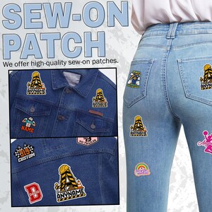 May include: A collection of colorful sew-on patches featuring various designs including construction-themed letters, sports jerseys, racing flags, and rainbows. The patches are displayed on a blue denim jacket and light blue denim jeans.