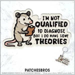 May include: Embroidered patch featuring a cartoon opossum holding a clipboard, with the text "I'M NOT QUALIFIED TO DIAGNOSE BUT I DO HAVE SOME THEORIES." A matching keychain is also visible. The brand name "PATCHESBROS" is at the bottom.