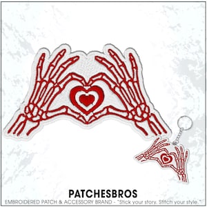 May include: Embroidered patch and keychain set featuring a red skeleton hand heart design. The patch and keychain have a white border. The text "PATCHESBROS" is at the bottom of the image.