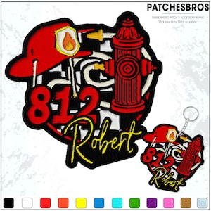May include: Embroidered patch and keychain set featuring a firefighter's helmet, fire hydrant, and the name "Robert". The patch has the number "812" in red, with a black and white checkered background. The keychain mirrors the patch design.