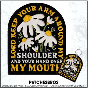May include: Black embroidered patch with white daisies and yellow centers, and the text "LORD KEEP YOUR ARM AROUND MY SHOULDER AND YOUR HAND OVER MY MOUTH." A matching keychain is also shown.