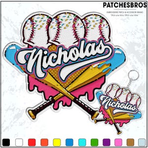 May include: Embroidered baseball-themed patch and keychain set. The patch features three baseballs, crossed bats, and the name "Nicholas" in a stylized font. The design incorporates pink, blue, yellow, and brown colors. The keychain mirrors the patch design.