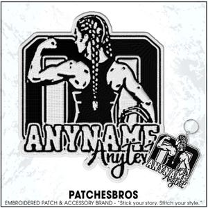 May include: Black and white embroidered patch featuring a muscular figure with the text "ANYNAME Anyley". A matching keychain is also visible. The patch and keychain are part of the PATCHESBROS brand.