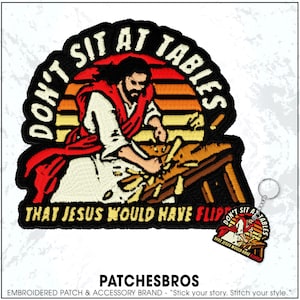 May include: Embroidered patch with the text "DON'T SIT AT TABLES THAT JESUS WOULD HAVE FLIPPED." The patch features an illustration of Jesus overturning a table, set against a sunset background. A keychain with a similar design is also present.