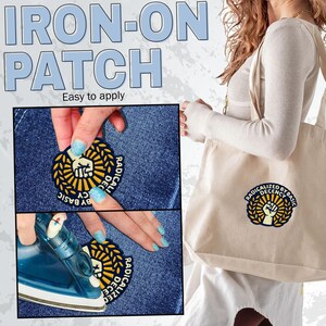 May include: A circular iron-on patch with the words "RADICALIZED BY BASIC DECENCY" and a fist emblem. The image shows the patch being applied to denim and on a tote bag. Easy to apply.